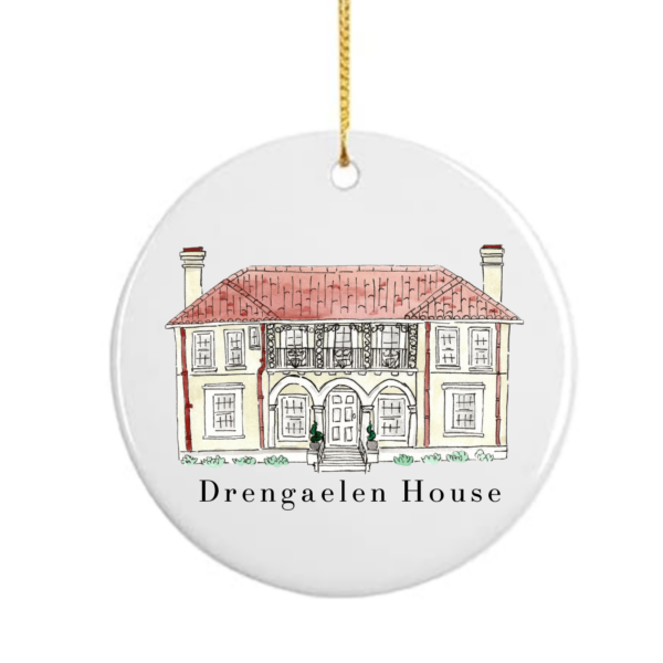 A white ceramic ornament disk with a drawing of Drengaelen House